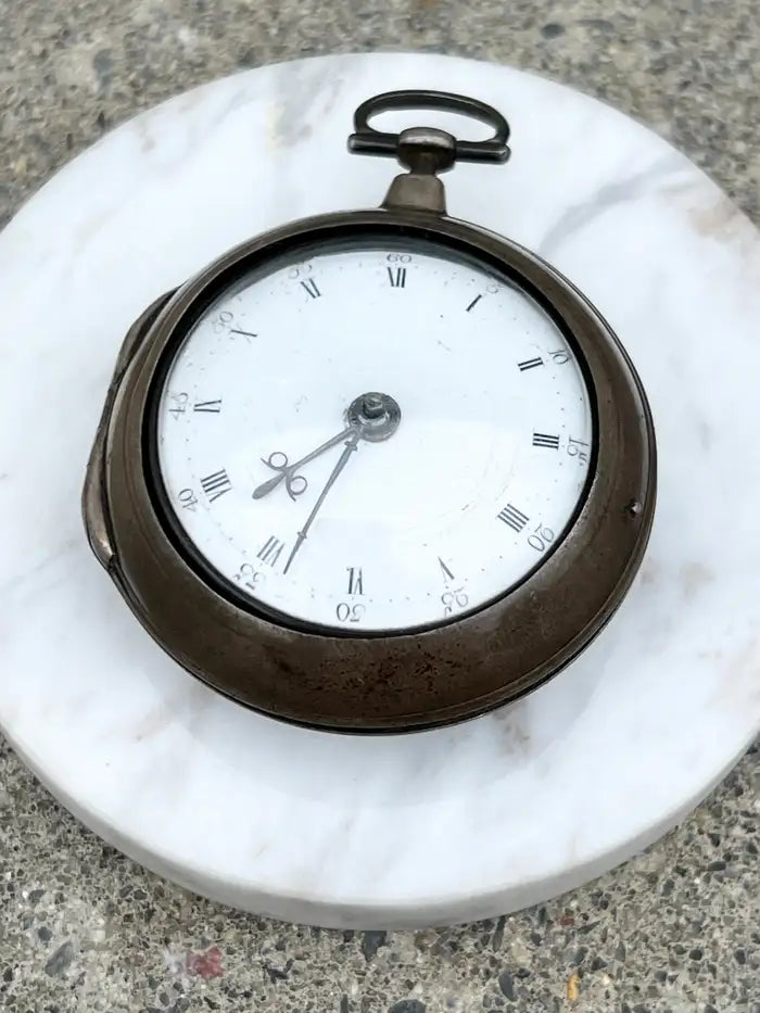 An antique Georgian pocket watch