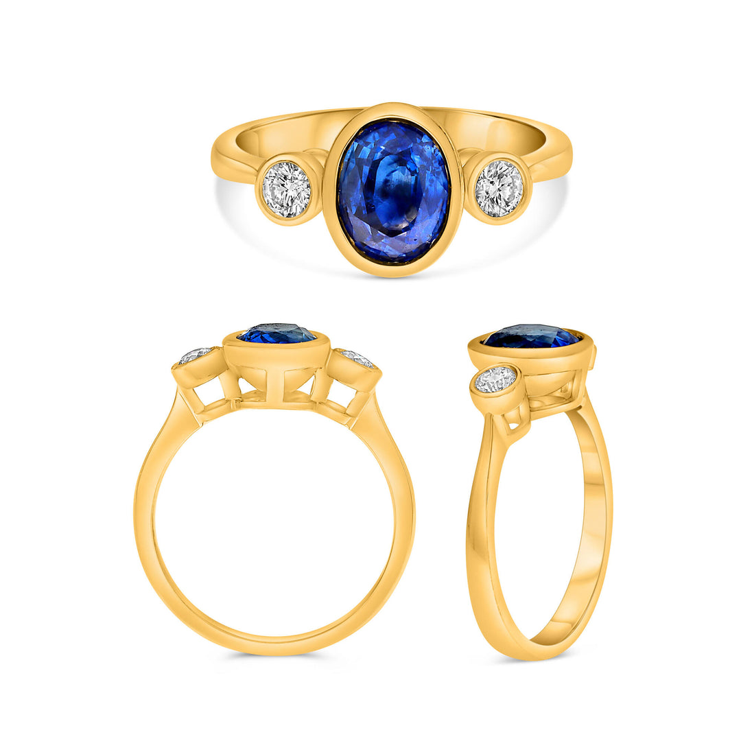 14K Yellow Gold 1.62CT Oval Blue Sapphire and Diamond Three-Stone Bezel Ring