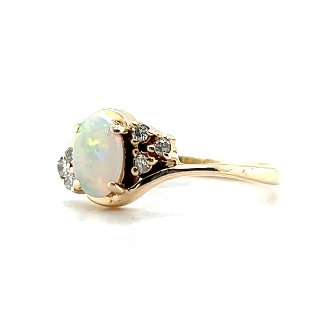 Estate 14K Yellow Gold 0.29CTW Oval Opal & Diamond Bypass Ring