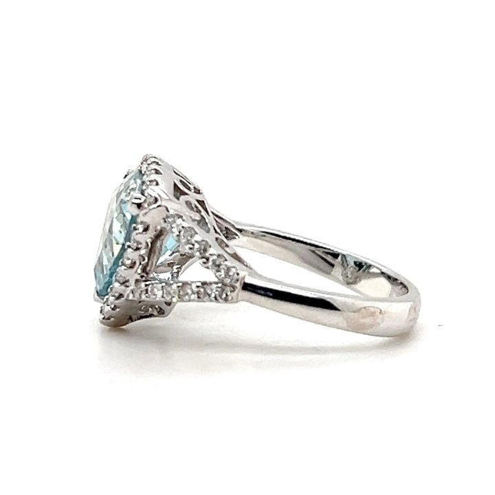 Estate 18K White Gold Trillion Aquamarine and Diamond Halo Cocktail Ring