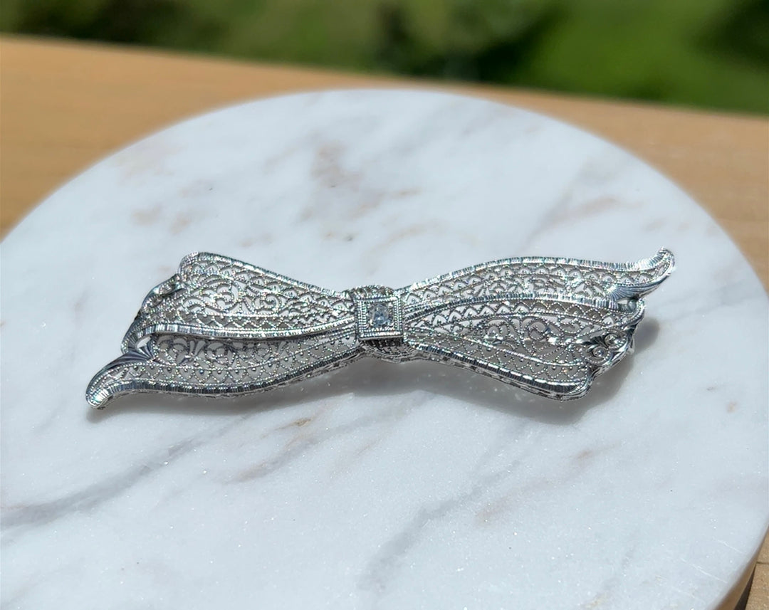 Estate 14K White Gold 0.07CTW Diamond Art Deco Filigree Bow Brooch