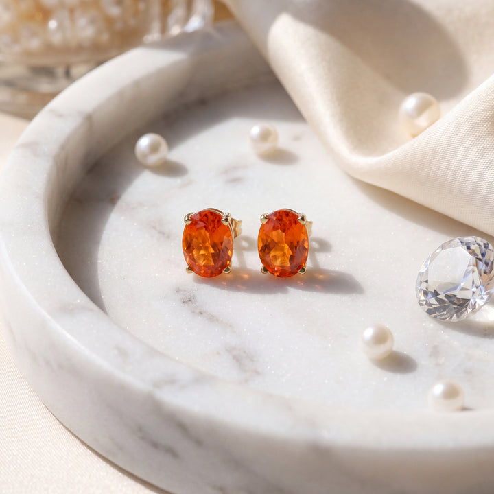 Estate 14KT Yellow Gold Oval Synthetic Orange Sapphire Studs