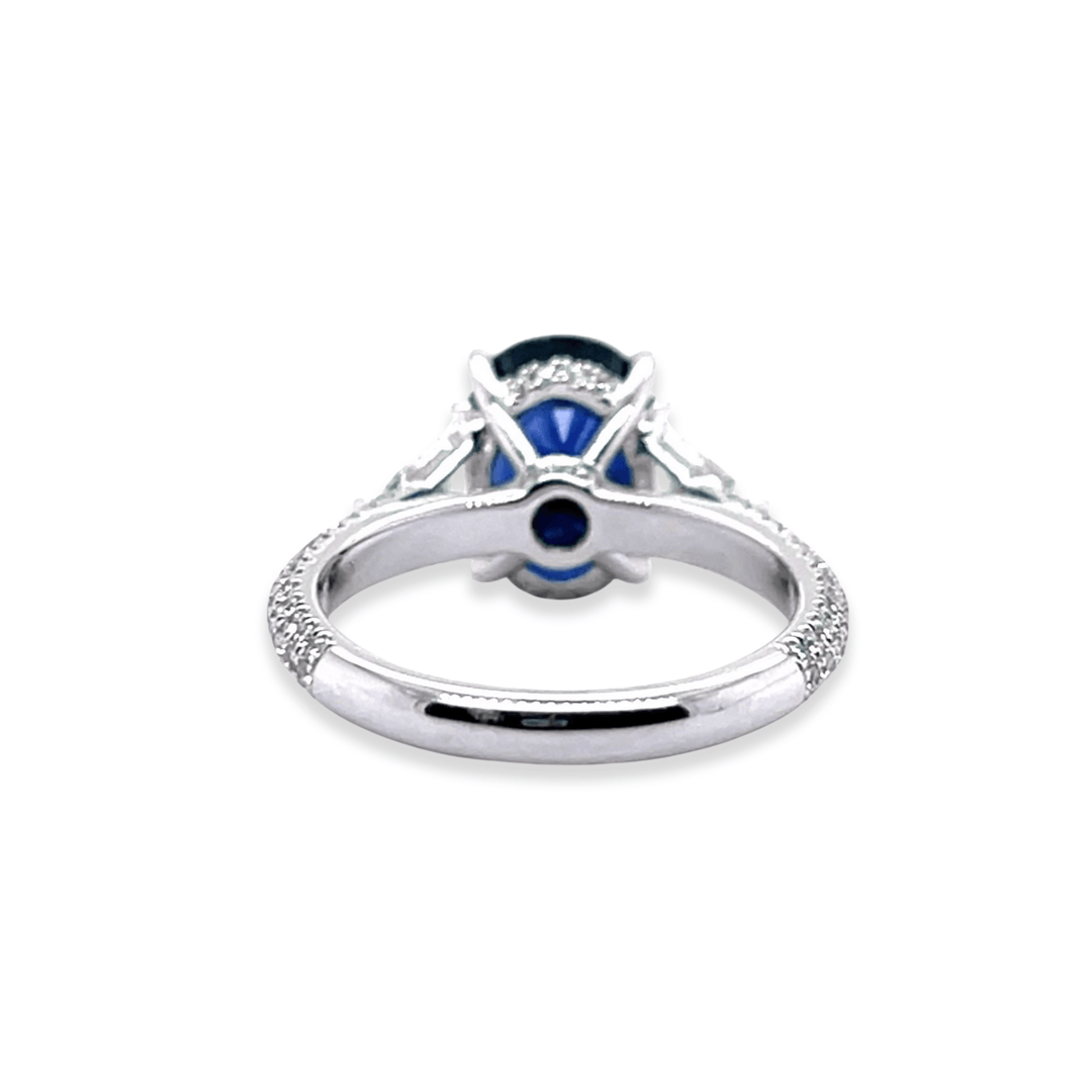 Platinum 5.60CTW Oval Blue Sapphire and Diamond Three-Stone Ring