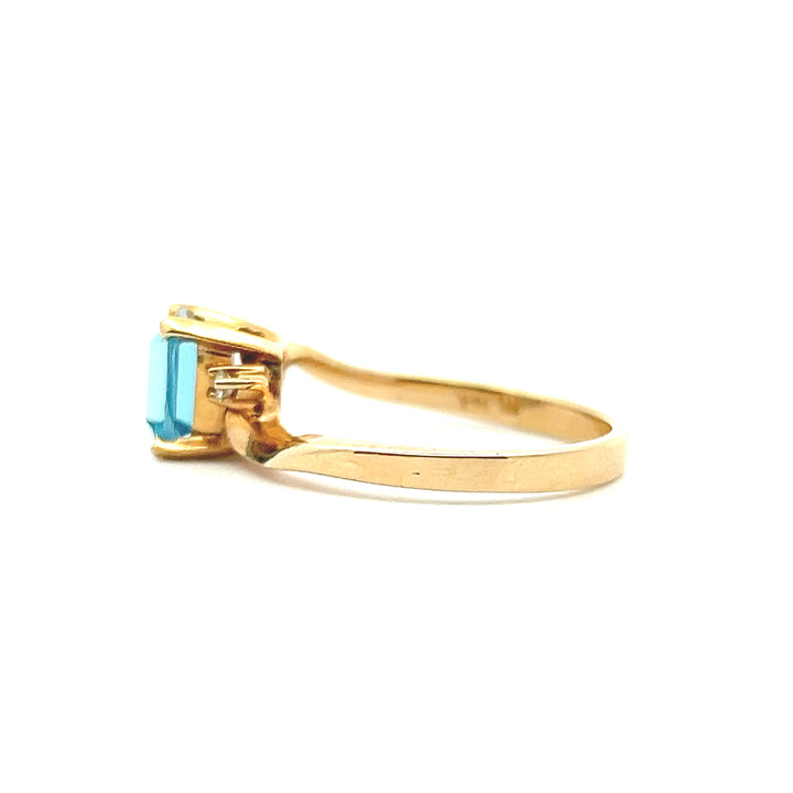 Estate 14K Yellow Gold Emerald Cut Blue Topaz & Diamond Bypass Ring
