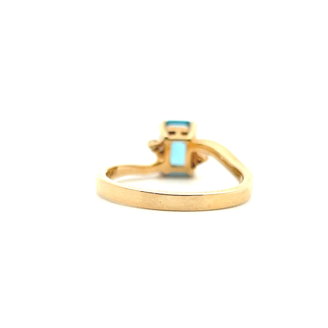 Estate 14K Yellow Gold Emerald Cut Blue Topaz & Diamond Bypass Ring