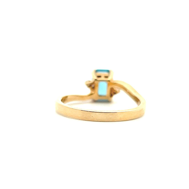 Estate 14K Yellow Gold Emerald Cut Blue Topaz & Diamond Bypass Ring