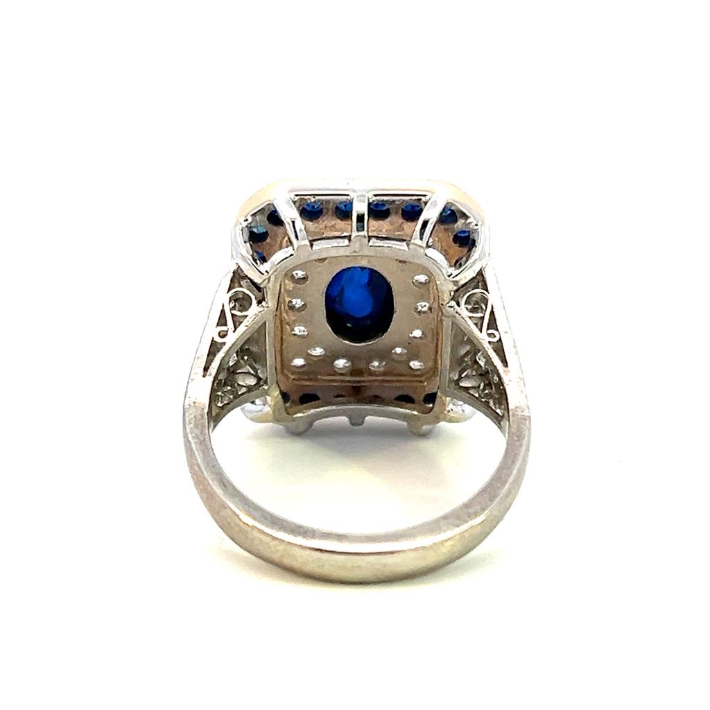 Estate Platinum & 18K Gold Oval Blue Sapphire & Diamond Halo Ring