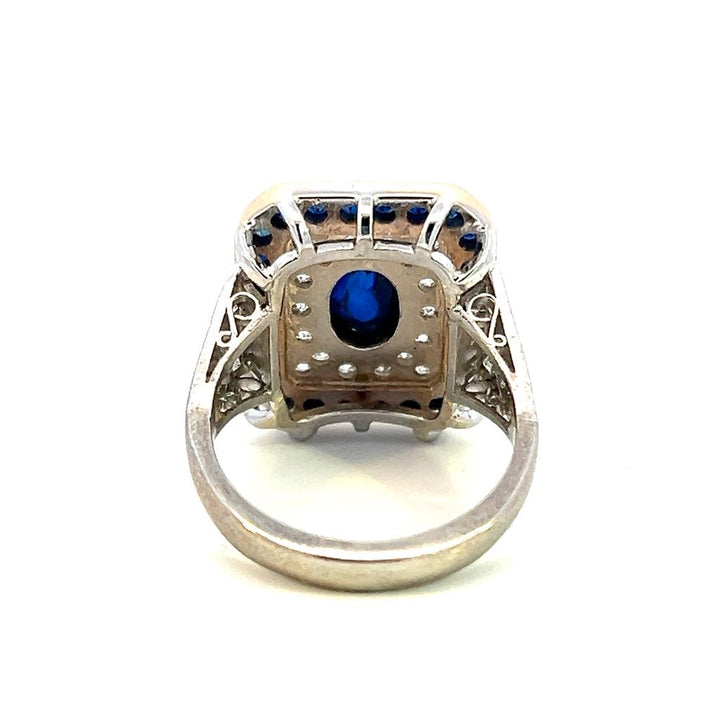 Estate Platinum & 18K Gold Oval Blue Sapphire & Diamond Halo Ring