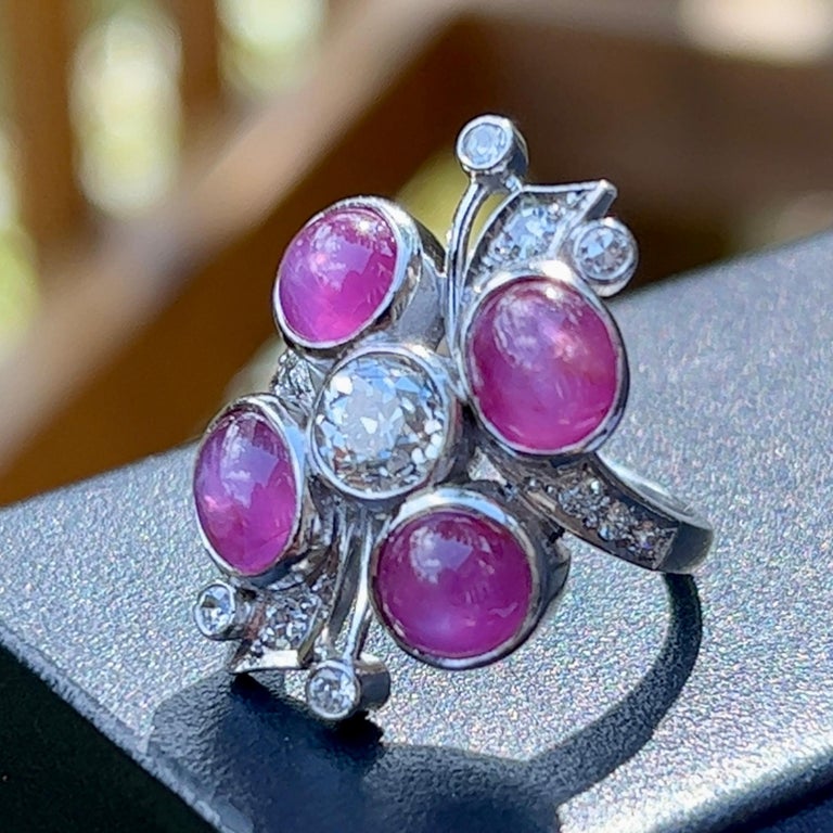 An estate vintage Retro pink sapphire and diamond ring