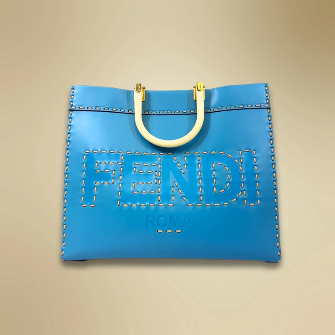 A blue leather Fendi brand luxury vintage handbag with yellow stiching and a yellow hand strap