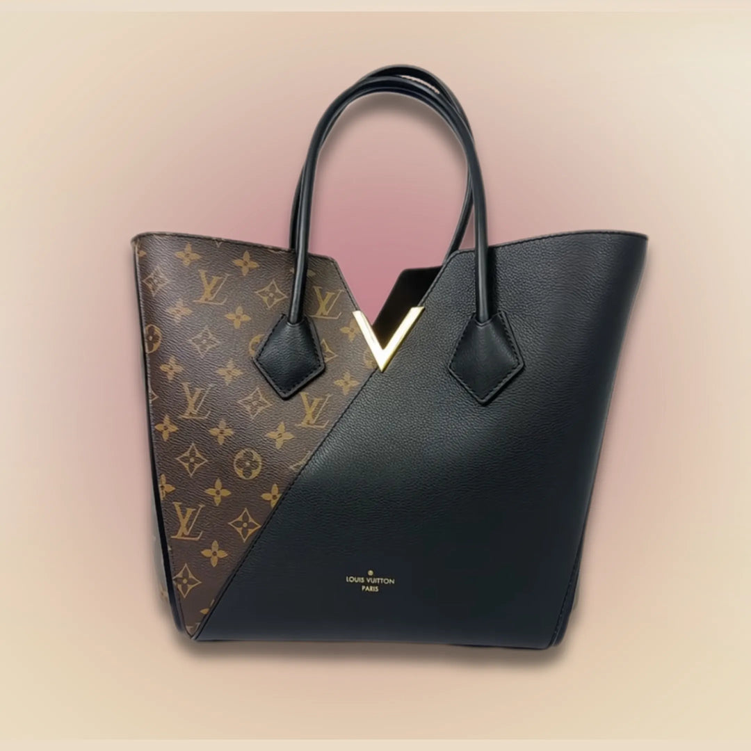 A brown and black leather luxury Louis Vuitton brand handbag