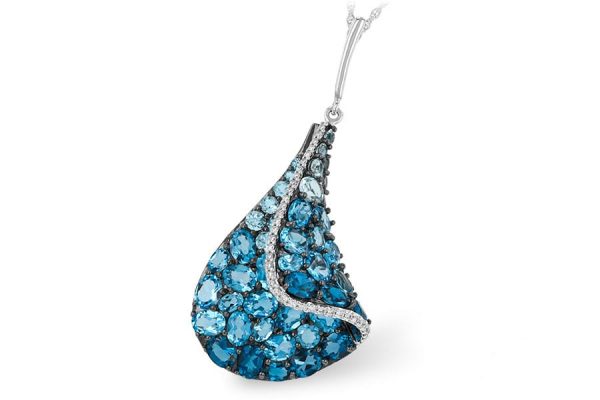 blue topaz and diamond pendant in white gold
