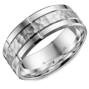 A white gold men's band with a hammered-finish center and high-polished edges with grooves and bevels