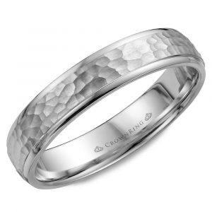 A white gold men's wedding band with a hammered-finish center and high-polished edges