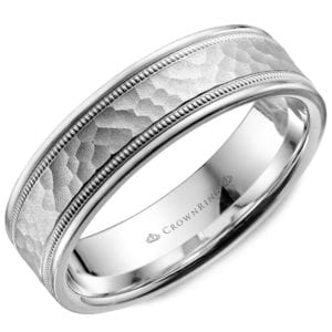 A white gold men's wedding band with a hammered-finish center, outer milgrain accents, and high-polished edges