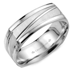 A white gold squared-shank band with diamond-cut accents