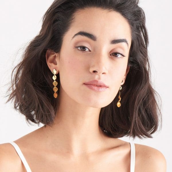 gold crush multiple discs drop earrings on model