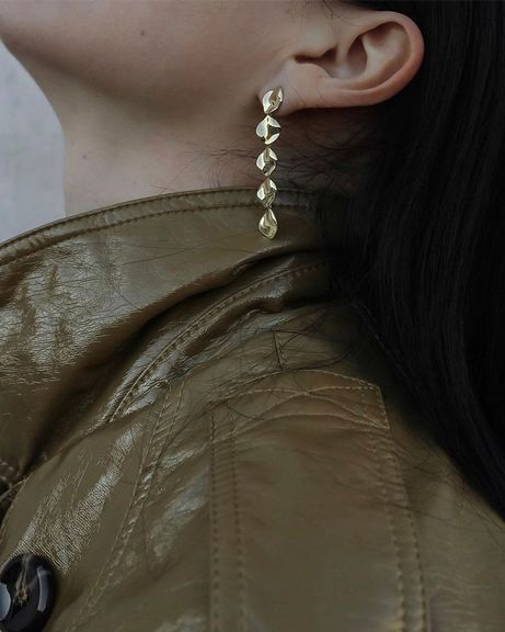 gold crush multiple discs drop earrings on model