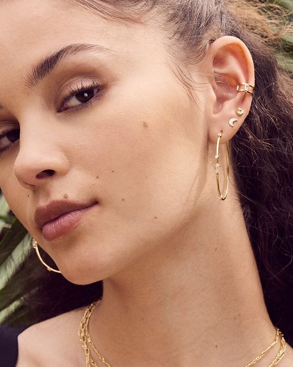 moon stud earrings on model