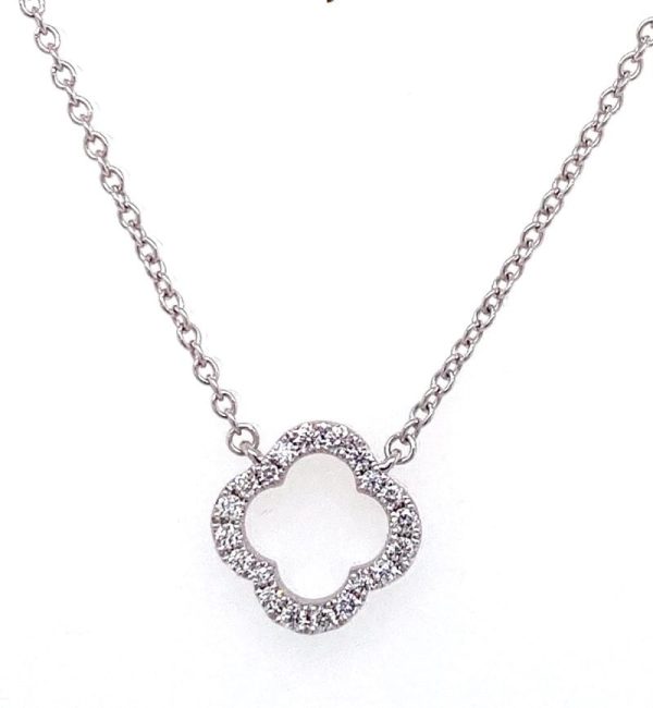 One 18 karat white gold diamond clover necklace by Hearts On Fire containing 0.12 carats of round brilliant diamonds. The pendant is fixed on an adjustable 18" chain.