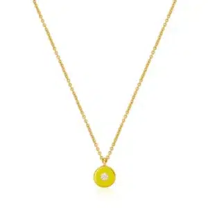 14 karat yellow gold-plated sterling silver necklace with a disc pendant coated in neon yellow enamel with a center round-faceted cubic zirconia accent. The necklace has adjustable length.