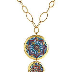 22 karat yellow gold leaf finish double-sided pendant necklace by Evocatuer featuring images of patterns found in the city of Pompeii. The pendant features a 1.5" disc with a short drop to a 1" disc . The pendant is attached to a 30" long oval link chain.