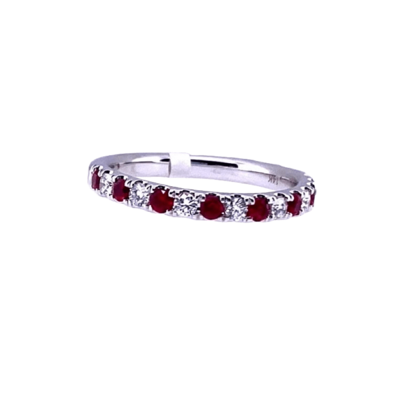 A 14 karat white gold straight-style band with alternating round brilliant diamonds and round rubies