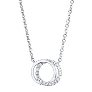 One 14 karat white gold necklace with a pendant with 2 overlapping circles, one set with diamonds and one polished. The necklace is adjustable in length and can be worn at 16" or 18" long