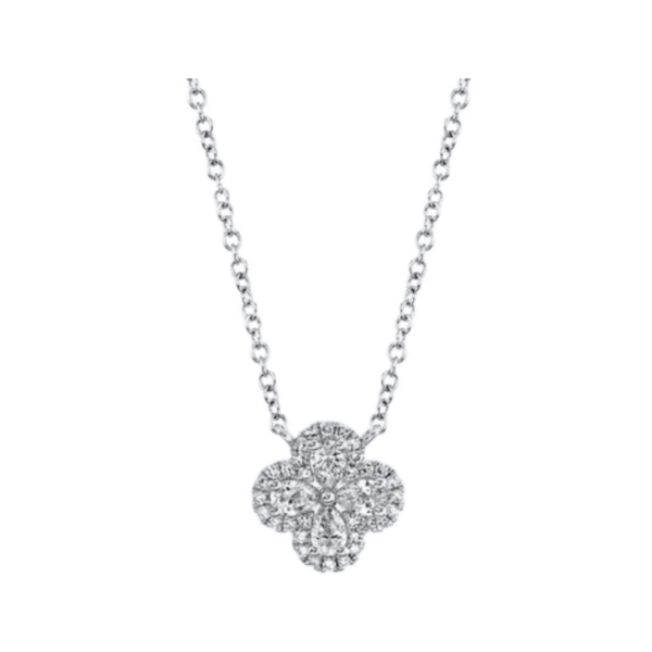 One 14 karat white gold diamond clover necklace by Shy Creation featuring 0.41 carat total weight of round diamonds. The pendant is fixed on a chain.