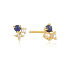 A pair of yellow gold-filled stud earrings each set with a cluster of a round lapis lazuli, round pearl, and round cubic zirconia