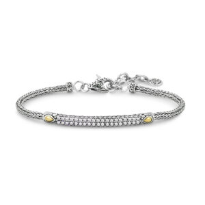 One sterling silver tulang naga bracelet with a bar pave-set with round white topazes and 2 solid 18 karat yellow gold accents