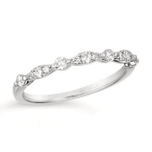 Platinum Diamond Wedding Band - Platinum diamond band by Le Vian with 13 round brilliant-cut diamonds weighing 0.24 carat total weight with G-H color and VS2-SI1 clarity in a scalloped design alternating between a single round diamond and a marquise shape set with 3 round diamonds.