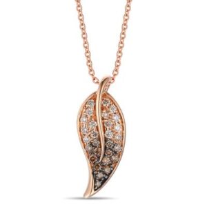 The Chocolate Diamond Leaf Necklace by Le Vian is an 18 karat rose gold pendant necklace by Le Vian containing a leaf-shaped pendant set with ombre round chocolate diamonds weighing 0.22 carat total weight. The darker chocolate diamonds have black rhodium plating accents. The pendant is set on an 18" chain.