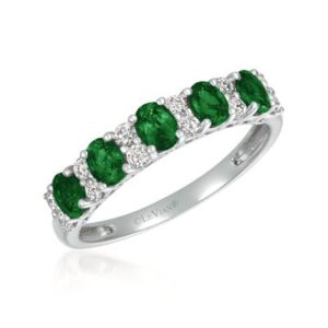 One 14 karat white gold fashion band by Le Vian with 5 oval emeralds weighing 0.65 carat total weight alternating with 12 round brilliant diamonds weighing 0.30 carat total weight