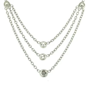 The Delicate Ripples Diamond Necklace adds a touch of sparkle. This 14 karat white gold necklace features 5 bezel set diamonds and a unique ripple design.