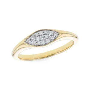 The Diamond Marquise Ring is crafted from 14 karat yellow gold and features a marquise-shaped ring top set with 15 round brilliant-cut diamonds weighing 0.14 carat total weight in a white gold inlay with white gold pave settings. By Allison Kaufman.