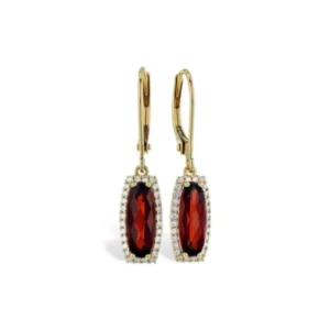 The Garnet and Diamond Drop Earrings are crafted from 14 karat yellow gold and feature 2 elongated cushion-shaped checkerboard-faceted garnets weighing 2.07 carats total weight. Each garnet is surrounded a halo of round diamonds weighing 0.18 carat total weight with G color and SI1-SI2 clarity.