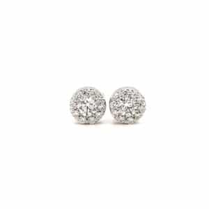 One estate pair of 18 karat white gold Fulfillment diamond stud earrings