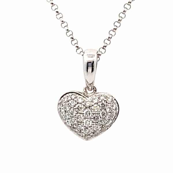 One 14 karat white gold diamond heart necklace containing 41 round brilliant diamonds weighing 0.37 carat total weight with G-H color and VS2 clarity set in a drop heart pendant and with diamonds bezel set in stations in the chain. The necklace measures 18" long.