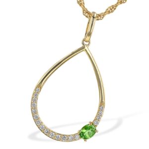 14K Yellow Gold Green Garnet and Diamond Necklace with an open teardrop pendant featuring an off-set oval green garnet and sparkling diamond accents