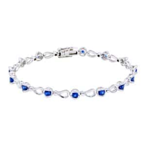A white gold link bracelet with round 15 blue sapphires