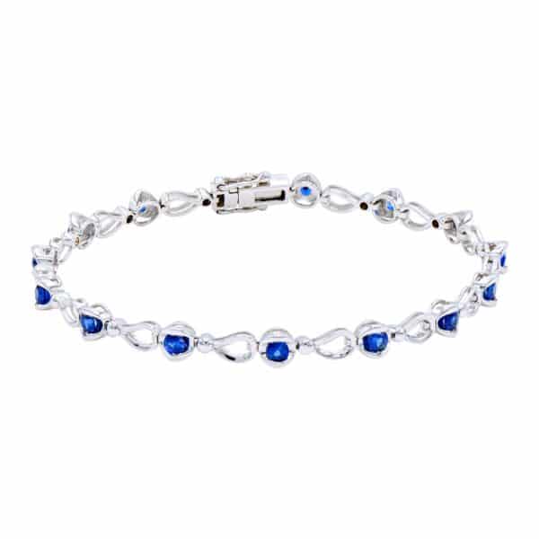 A white gold link bracelet with round 15 blue sapphires