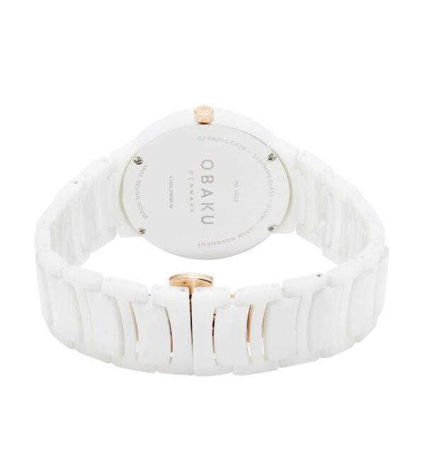A ceramic quartz analog watch with a white bracelet and band and rose gold-tone accents
