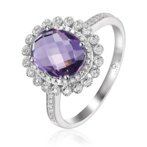 14 karat white gold Art Deco-inspired fashion ring with a center oval-shaped faceted amethyst weighing 2.08 carats and 62 round brilliant diamonds weighing 0.18 carat total weight set in a double floral-inspired halo and in the shoulders of the band with milgrain details accenting the diamonds