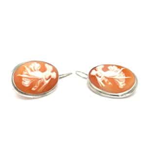 An estate pair of sterling silver shell cameo drop earrings from the mid-century jewelry era