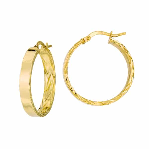One pair of 14 karat yellow gold hoop earrings with dual texture including a polished outside and textured interior