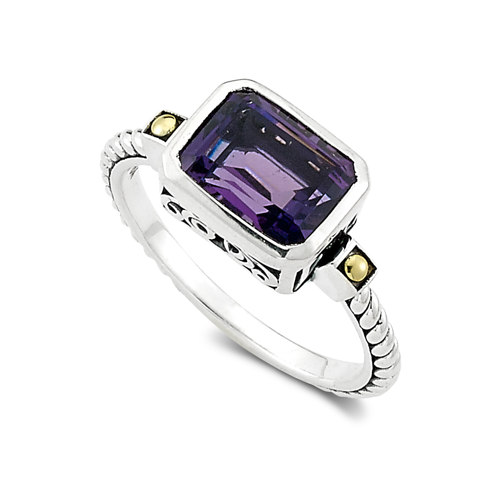 One sterling silver Eirini ring with solid 18 karat yellow gold accents and an emerald-shaped amethyst