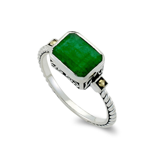 One sterling silver Eirini ring with solid 18 karat yellow gold accents and an emerald-shaped emerald