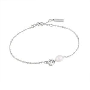 A sterling silver chain bracelet with a pearl and circle link pendant