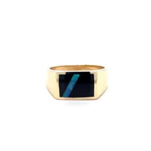 One estate 14 karat yellow gold flat top ring with a rectangle-shaped tablet of black onyx set with an streak inlay of opal